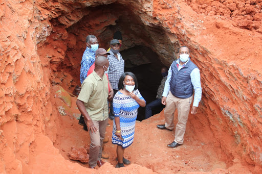 Taita Taveta Deputy Governor Majala Mlagui and Mining PS Peter Kaberia with other government officials during a visit  to Chawia mine.