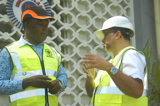 Principal Secretary for Industry Juma Mukhwana with Milly Glass vice chairman Mohamed Rashid at the plant's operations in Liwatoni in Mombasa on Saturday, June 24, 2023. 