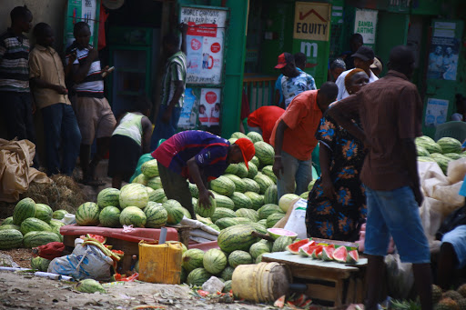 Traders defy county government order to stay away from Kongowea market on Monday morning. 