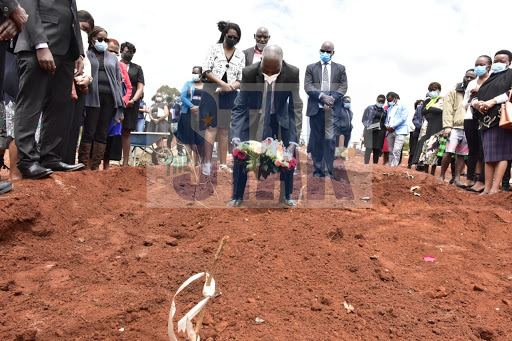 Lawyer Gerald Mwirichia pay his last tribute to his late daughter Kawira Mwirichia during her burial at Lang'ata cemetry on November 10,2020/ MERCY MUMO