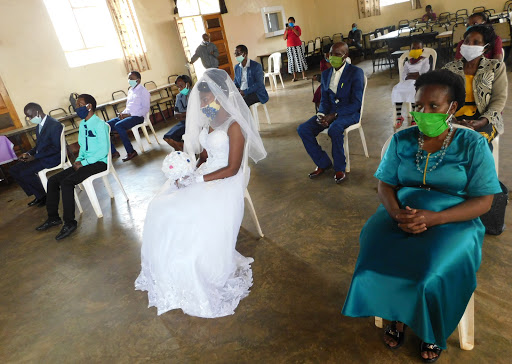 Chrisco church members keep distance during the wedding of Godfrey Mutwiri and Grace Nkatha