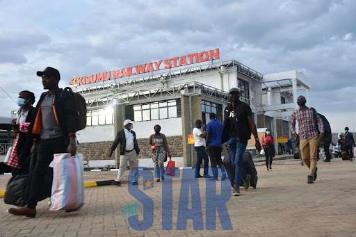 Passengers who arrived at the Kisumu Railways station aboard the maintain commuter train.