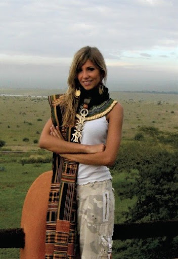 Miss Europe Alexandra wearS a faience collar for the cover of French TV Guide at The African Heritage House.