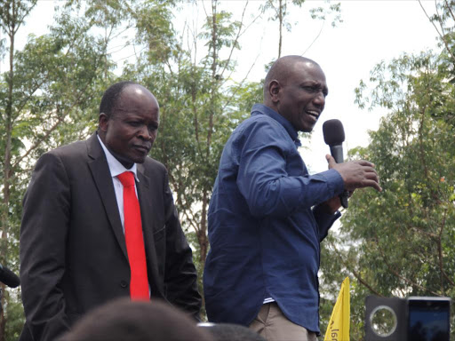 Deputy President William Ruto with Migori governor Okoth Obado at a public meeting at Masara in Suna West in 2018 / FILE