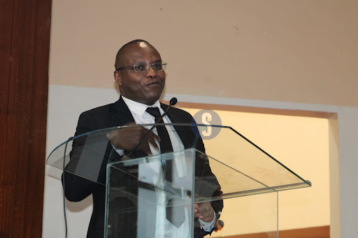 Dr Wyne Mutuma speaking during the launch of the book 'The Supreme Court Settles the Law' at the University of Nairobi School of law on November 15, 2023.