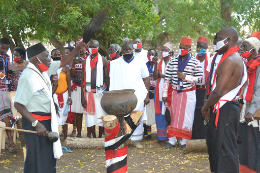 Abdalla Mnyenze a Mijikenda Kaya Elder from Kaya Kinond  conduct rituals before officially launching of the new traditional court which was opened by George Kithi -in Stripes shirt- at Magarini cultural centre on September 9