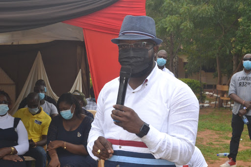 Kilifi Assembly Speaker Jimmy Kahindi addressing students and parents during the official handing over of St Thomas Girls Secondary School's administration block built by Kilifi North MP Owen Baya through the NG-CDF