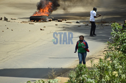 A burnt tyre along Riverside Drive on July 13, 2021.