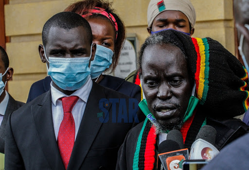 Sheria Mtaani director lawyer Shadrack Wambui with Rastafari Society of Kenya Chairman Ras Lorjoron during a press briefing at the Milimani Law Court after filing a petition seeking to decriminalize Marijuana on May 17, 2021.