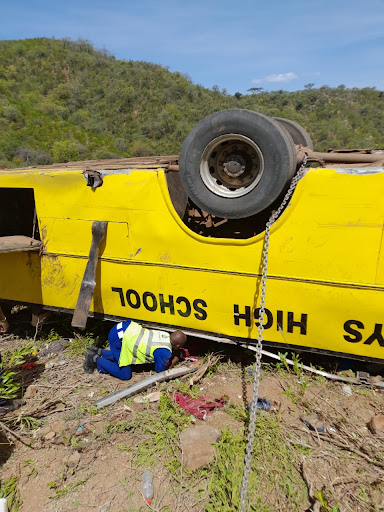 A police officer at the scene of Kapsabet Buys school bus accident along Karbaret-Marigat Road in Baringo County on March 16, 2024.