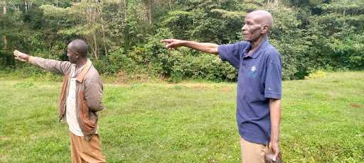 Suleiman Nyaga (left), with Solomon Ireri, at Gogo Salt Lick in Mukuuri, Embu.