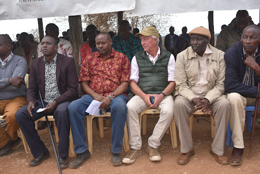 From right to left are the drought mitigation steering committee members Jackson Sakimpa, Paul Ntiati, Richard Bonham, Charles Likama, and Daniel Parnoti in Imbirrikani on Monday during the launch of food-for-work program for 800 women.