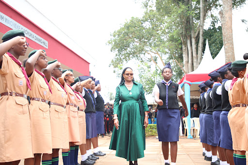 Chief Justice Martha Koome inspects a guard of Honour mounted by Starehe Girls Girl Guides during the school's Founders' Day ceremony on Saturday, September 23, 2023.