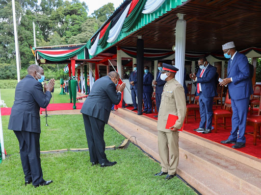 President Uhuru Kenyatta and his deputy Dr. William Ruto greet a section of the leaders who graced the 57th Madaraka Day Celebrations at State House Gardens, Nairobi.