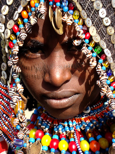 A woman from the Afar tribe, Ethiopia, wears colourful African jewellery