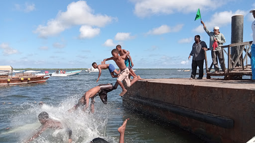 Children swimming on the shores of the Indian Ocean in Lamu.