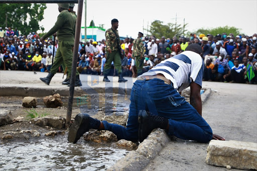 Mombasa residents after the nationwide curfew took effect on Friday, March 27, 2020.