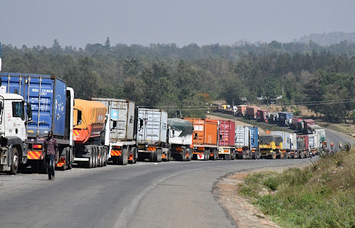 Long distance trucks along the Malaba-Bungoma highway.